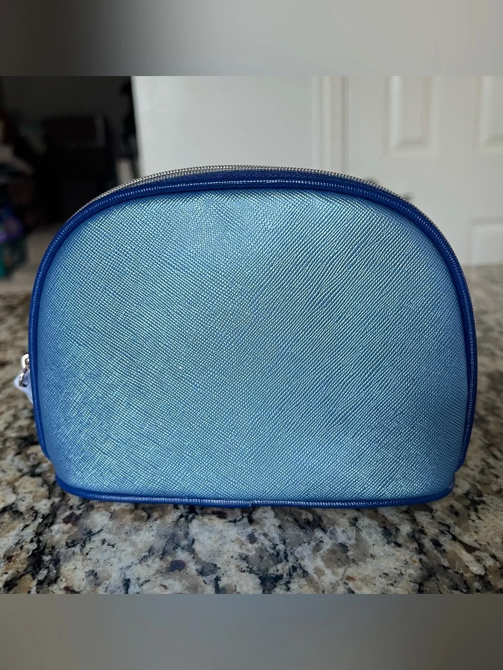 La Mer Metallic Blue Saffiano Faux Leather Cosmetic Bag